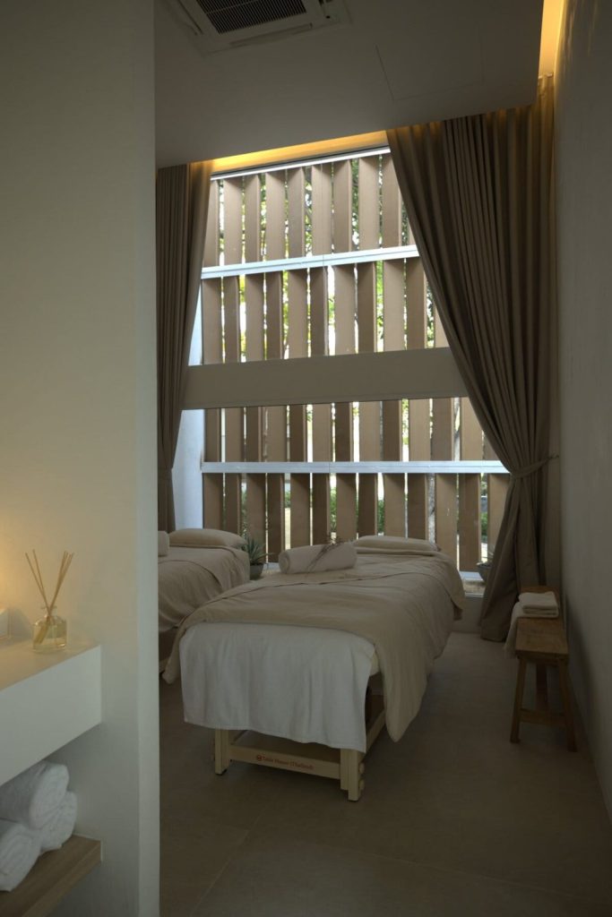 Aromatherapy spa room with two massage tables.